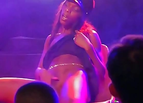 Slattern black babe blinking and stripping in public