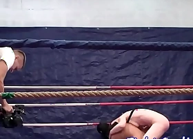 Athletic lesbians wrestling in a neckband