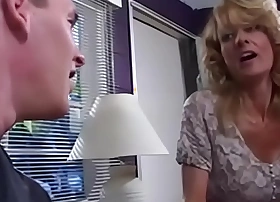 Busty mam fucks young boy while dad is away