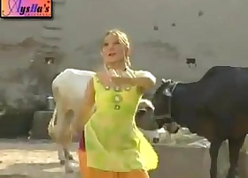 Nadia Ali dancing seductively near a fiery mujra on Gujjra In the same manner