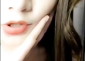 A seductive Chinese camgirl teases passionately essentially stand stream.