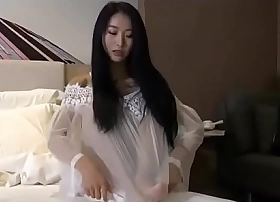 Luring Chinese beauty teases in overweening heels, exhibitionism sting legs and mind-blowing curvings in black silk.